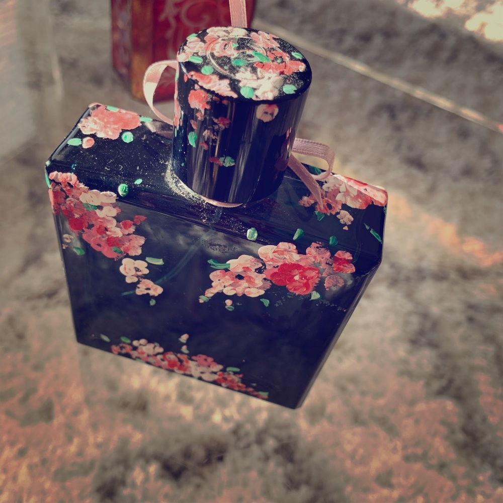 Hand painted square floral bottle.
